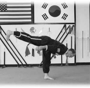 Flexibility and control is demonstrated in a kick development technique