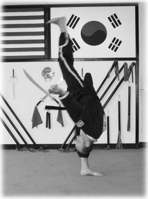 Flexibility and control is demonstrated in a kick development technique